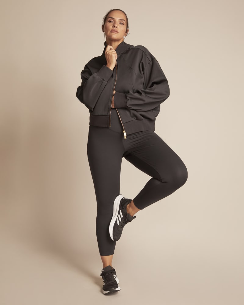 Front of a model wearing a size 1X 11 Honoré x Adidas Cover Up in Black by Adidas x 11 Honoré. | dia_product_style_image_id:248479